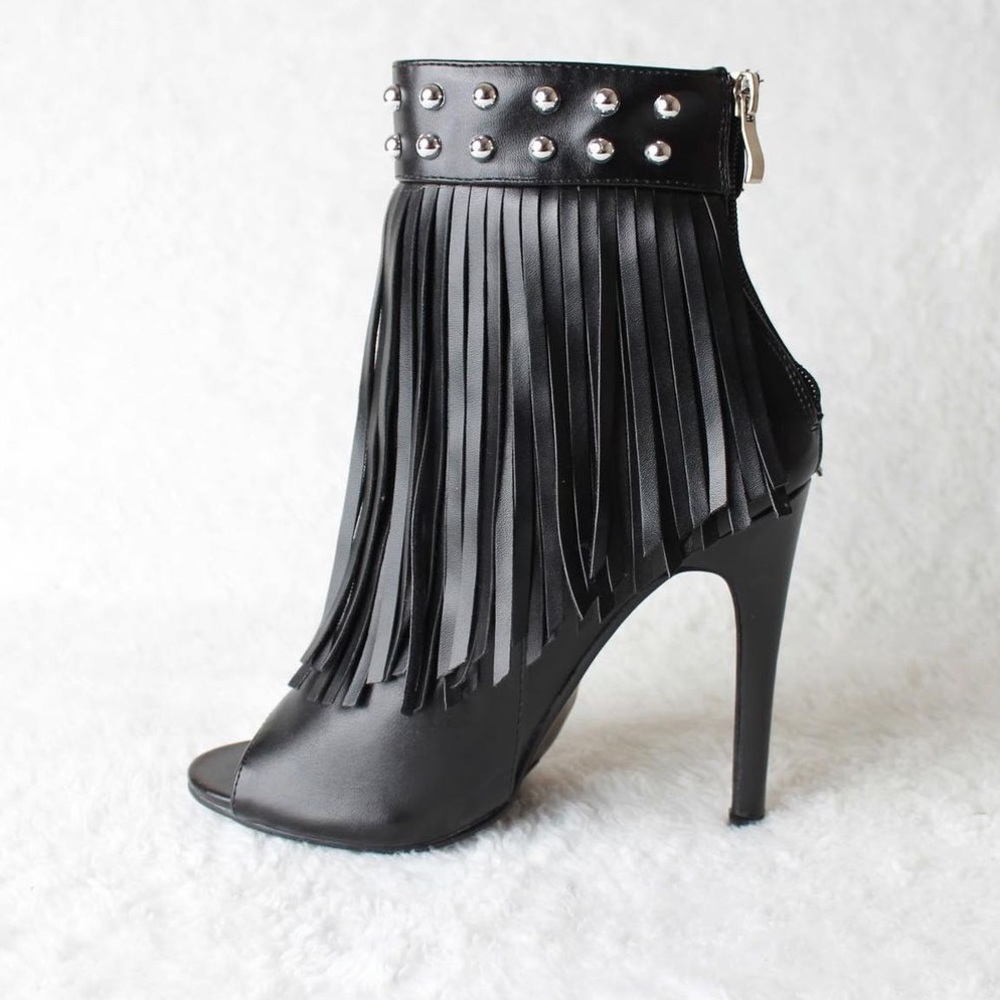 Brand new ankle tassel booties.